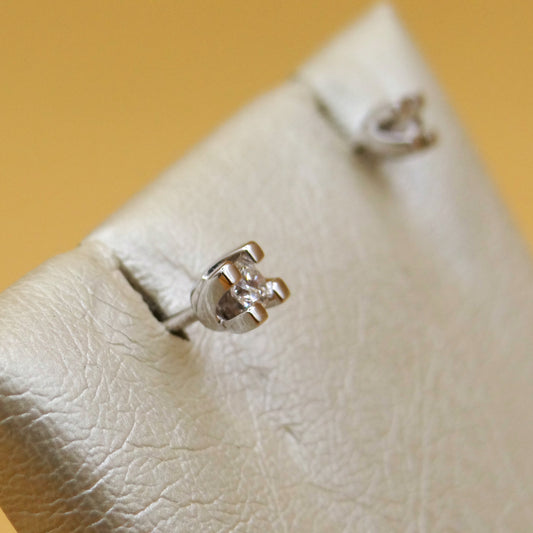 Orecchini punto luce Miluna in oro bianco e diamanti